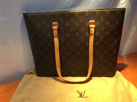 louis vuitton cartera.